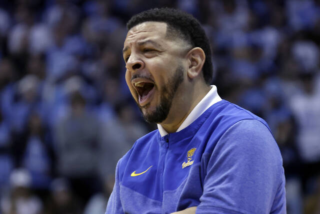 Pitt coach Jeff Capel directs the team against North Carolina during the first half of an NCAA college basketball game Wednesday, Feb. 1, 2023, in Chapel Hill, N.C.