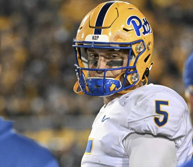 Pitt’s Phil Jurkovec sits on the bench after throwing his second interception on the night against West Virginia on Saturday.