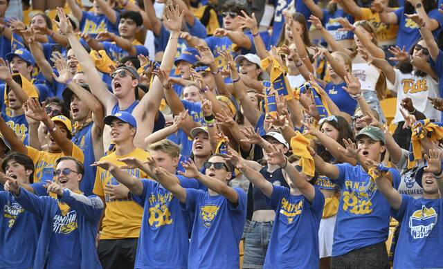 Pitt students sing “Sweet Caroline” before the fourth quarter against Wofford Saturday, Sept. 2, 2023, at Acrisure Stadium.