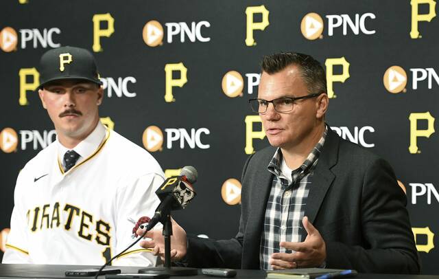 Pirates general manager Ben Cherington answers a question next to first round draft pick Paul Skenes during a press conference on Tuesday, July 18, 2023, at PNC Park.