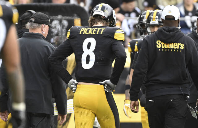Former Steelers quarterback Kenny Pickett leaves the field in a Dec. 3 game against the Arizona Cardinals at Acrisure Stadium.
