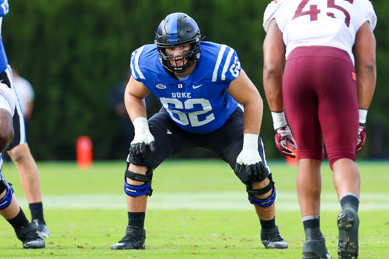Graham Barton (62) of the Duke Blue Devils gets set on the line during a football game between the Duke Blue Devils and the Virginia Tech Hokies on Nov 12, 2022 at Wallace Wade Stadium in Durham, NC.