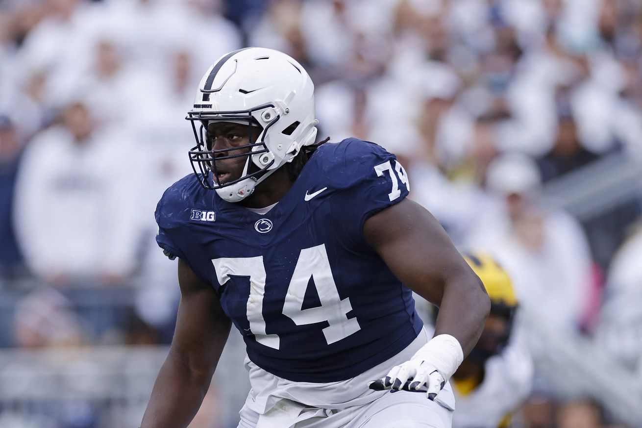 Penn State Nittany Lions offensive lineman Olumuyiwa Fashanu (74) blocks during a college football game against the Michigan Wolverines on November 11, 2023 at Beaver Stadium in University Park, Pennsylvania.