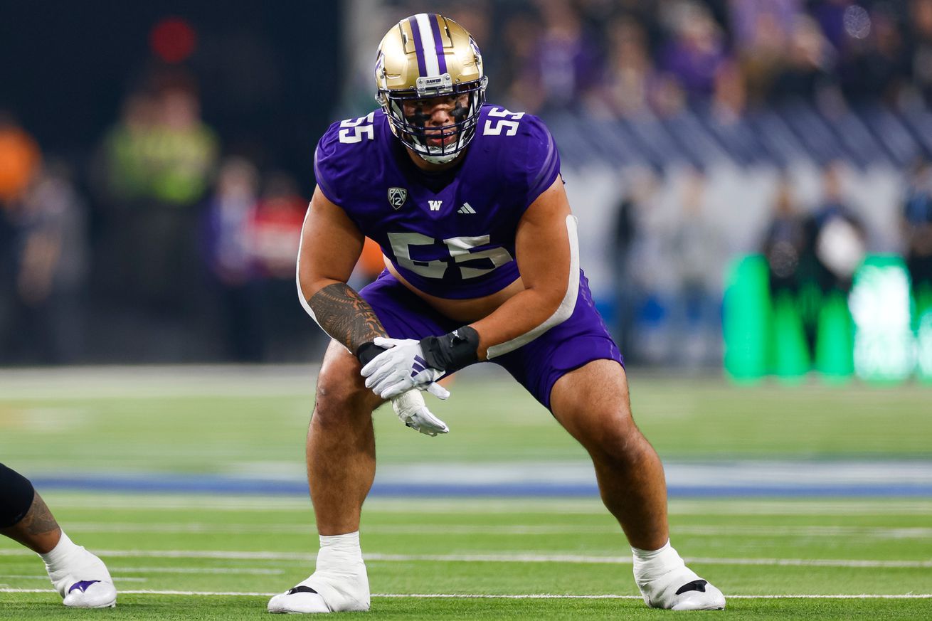Troy Fautanu #55 of the Washington Huskies in an offensive stance during the Pac-12 Championship game against the Oregon Ducks at Allegiant Stadium on December 1, 2023 in Las Vegas, Nevada.