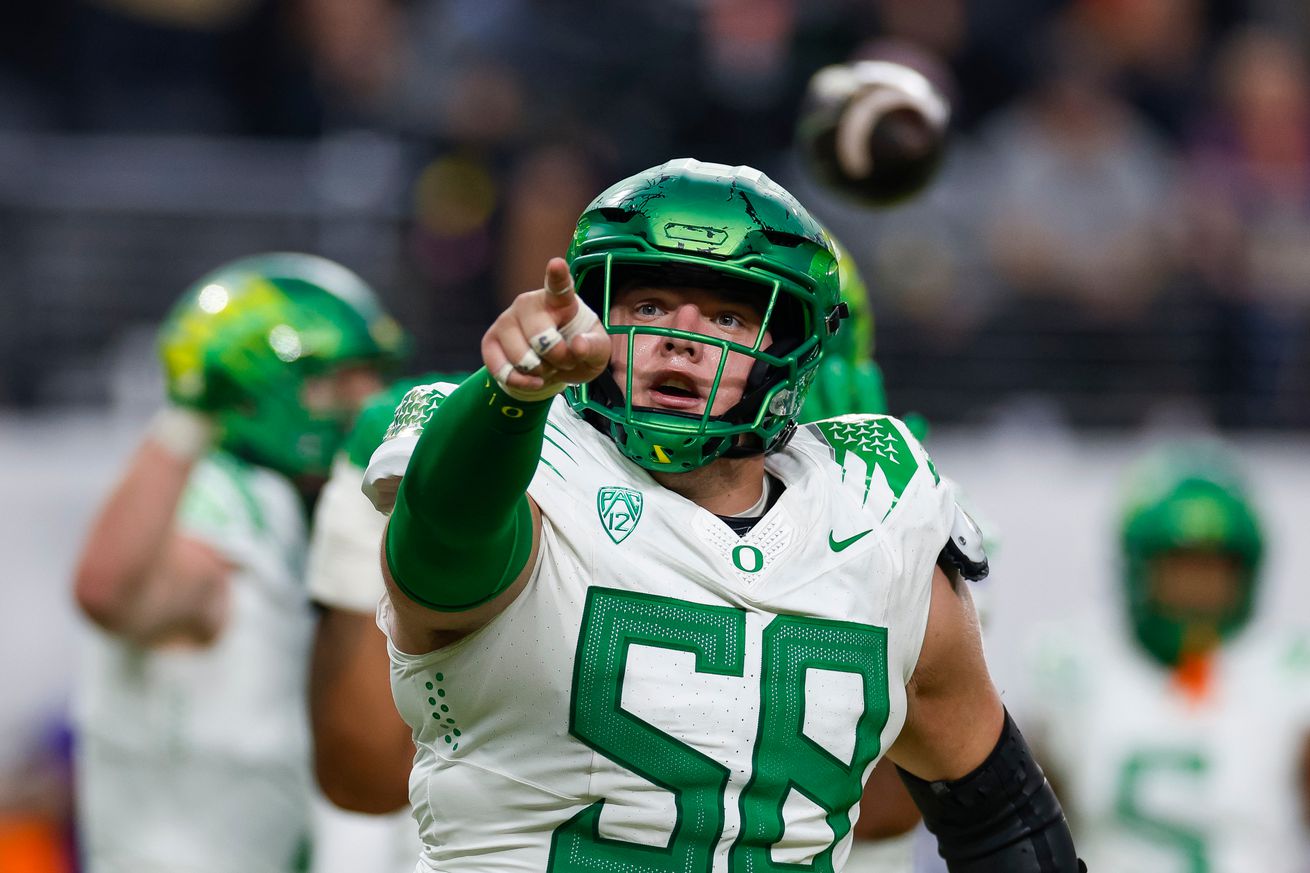 Jackson Powers-Johnson #58 of the Oregon Ducks reacts during the Pac-12 Championship game against the Washington Huskies at Allegiant Stadium on December 1, 2023 in Las Vegas, Nevada.
