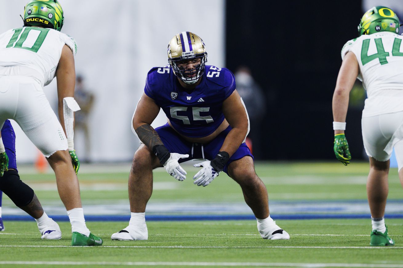 Troy Fautanu #55 of the Washington Huskies in an offensive stance against the Oregon Ducks during the Pac-12 Championship at Allegiant Stadium on December 1, 2023 in Las Vegas, Nevada.