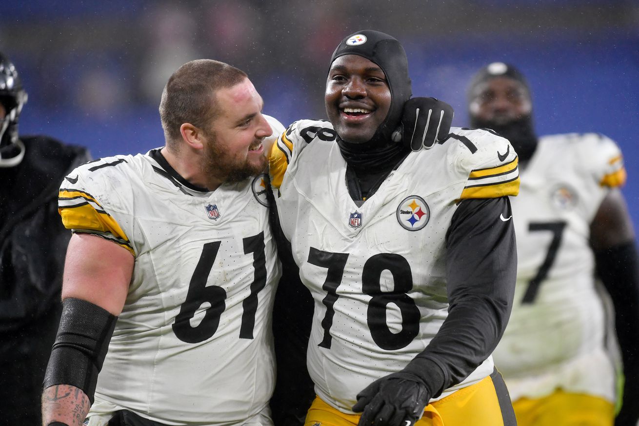 Steelers center Mason Cole (61) and guard James Daniels (78) smile while walking off the field after the Pittsburgh Steelers versus Baltimore Ravens NFL game at M&T Bank Stadium on January 6, 2024 in Baltimore, MD.