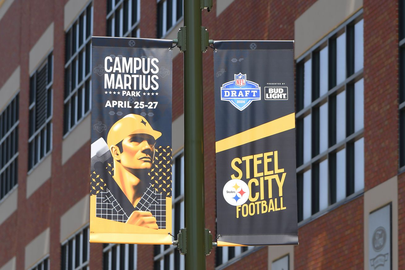 A general exterior view of Ford Field, home of the NFL Detroit Lions, with signs displayed on the light post to announce the upcoming NFL draft. The draft is scheduled to be held around Campus Martius Park and Hart Plaza in Detroit, Michigan on April 25–27, 2024. Photo taken prior to the MLB game between the Detroit Tigers and the Texas Rangers at Comerica Park on April 18, 2024 in Detroit, Michigan.
