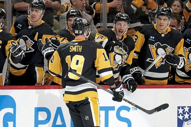 Penguins winger Reilly Smith celebrates at the bench after scoring against the Nashville Predators during the second period Monday.