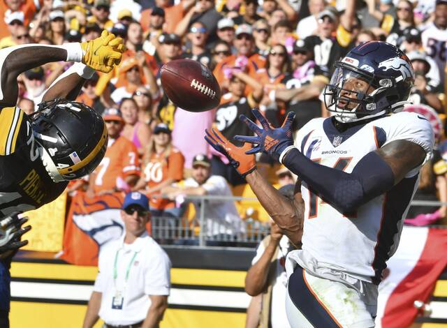 The Steelers’ James Pierre breaks up a pass intended for the Denver Broncos receiver Courtland Sutton in an Oct. 10, 2021, game at then Heinz Field.
