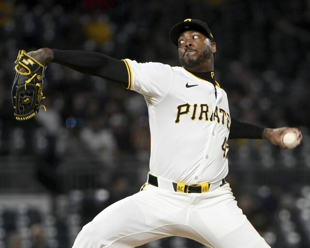Pirates reliever Aroldis Chapman pitches during the eighth inning against the Tigers on April 8.