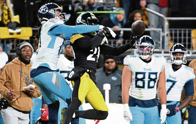 The Steelers’ Levi Wallace defends a pass intended for the Tennessee Titans’ DeAndre Hopkins on Nov. 2, 2023, at Acrisure Stadium.