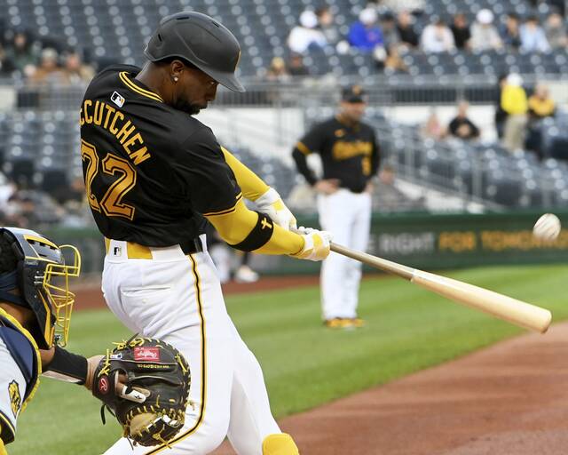 Pirates designated hitter Andrew McCutchen hits a leadoff home run during the first inning against the Brewers on Tuesday.
