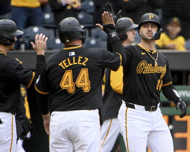 Pirates catcher Joey Bart celebrates his 3-run home run with Rowdy Tellez and Bryan Reynolds during the first inning against the Brewers on Thursday, Apr. 25, 2024, at PNC Park.
