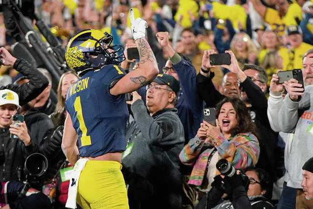 Michigan wide receiver Roman Wilson celebrates after scoring a touchdown during the College Football Playoff semifinal Jan. 1. Wilson was drafted by the Pittsburgh Steelers in the third round Friday.