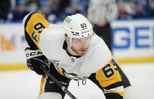 Pittsburgh Penguins left wing Radim Zohorna (63) against the Tampa Bay Lightning during the first period of an NHL hockey game Wednesday, Dec. 6, 2023, in Tampa, Fla.