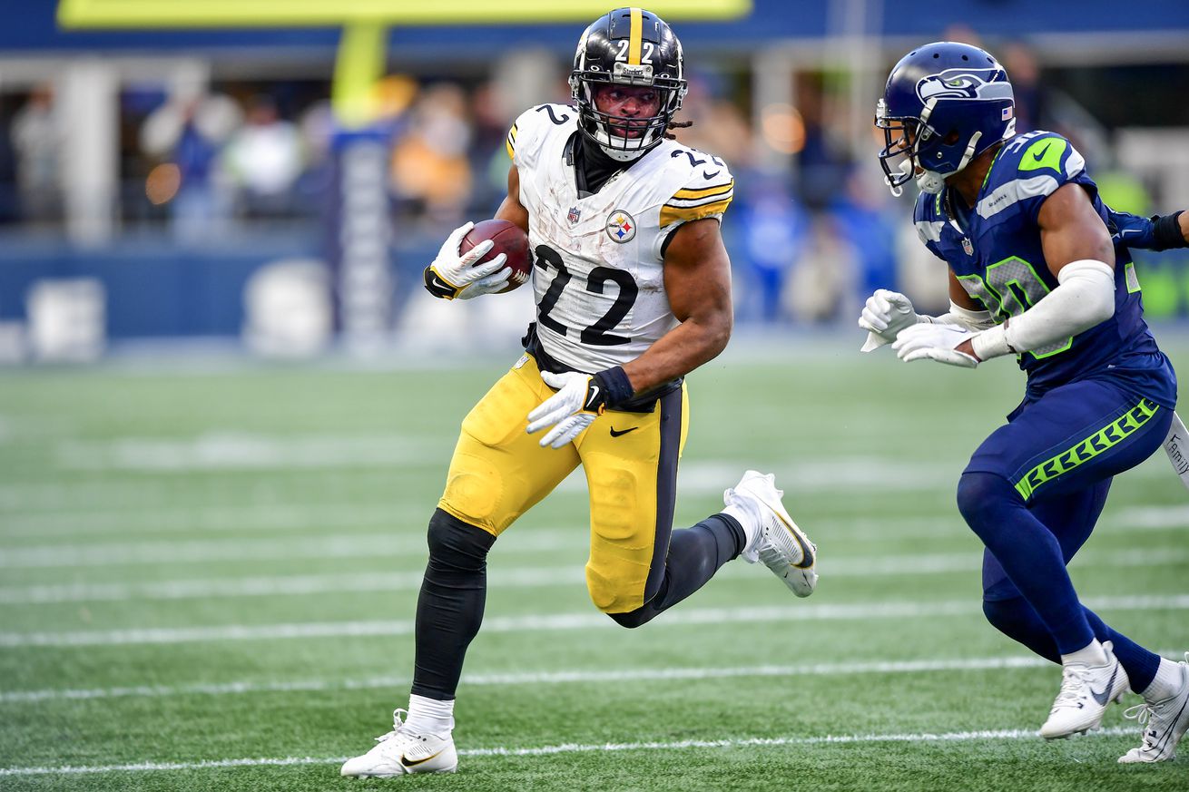 Najee Harris #22 of the Pittsburgh Steelers runs with the ball during the fourth quarter of a game against the Seattle Seahawks at Lumen Field on December 31, 2023 in Seattle, Washington.