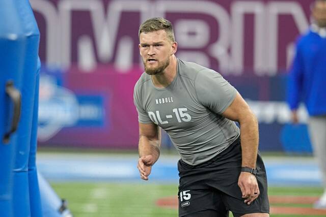 Former Iowa defensive lineman Logan Lee runs a drill at the NFL combine in February. Lee was drafted last week by the Pittsburgh Steelers in the sixth round.