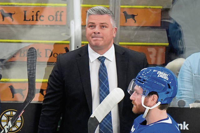 Toronto Maple Leafs head coach Sheldon Keefe watches from the bench in a March 7 game against the Bruins in Boston.