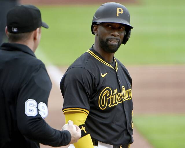 Pirates designated hitter Andrew McCutchen stares down home plate umpire Tom Hanahan after being called out on strikes to end the sixth inning against the Brewers on April 25, 2024.