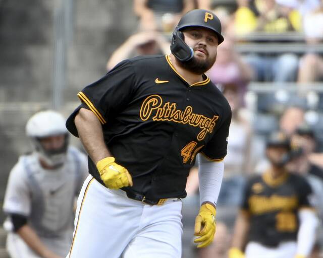 Pirates first baserman Rowdy Tellez watches his double during the sixth inning against the Rockies on Sunday, May 5, 2024, at PNC Park.
