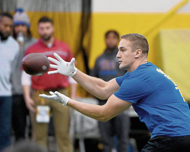 Phil Jurkovec catches a pass during Pitt’s pro day March 27 on the South Side.