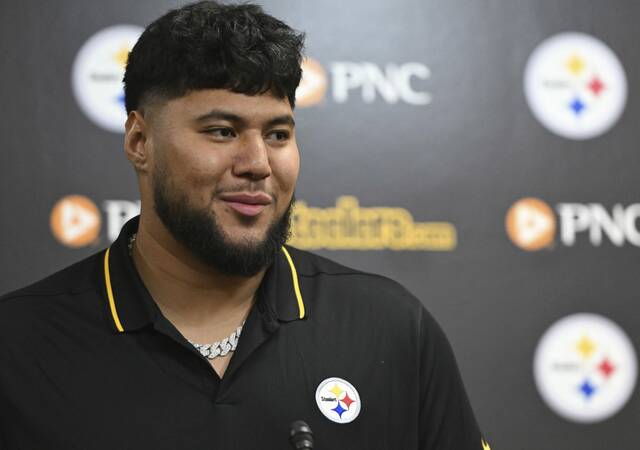 Steelers first-round pick Troy Fautanu speaks to the media during his introductory news conference April 26.