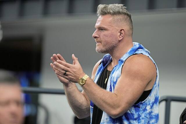 Pat McAfee watches a game between the Indianapolis Colts and the Houston Texans in January.