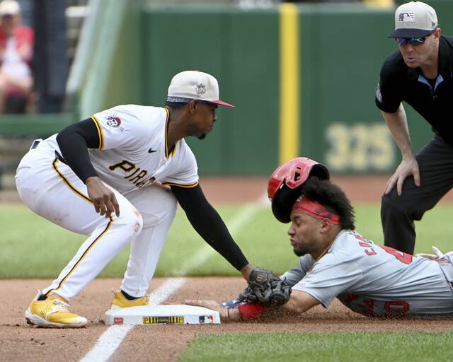 Pirates third baseman Ke’Bryan Hayes tags out the Cardinals’ Willson Contreras on a caught stealing on Thursday, July 4, 2024, at PNC Park.