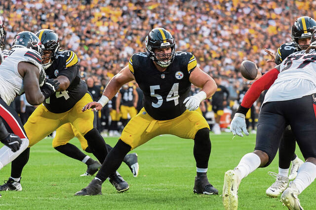 Pittsburgh Steelers center Zach Frazier blocks during an NFL football game, Friday, Aug. 9, 2024, in Pittsburgh.