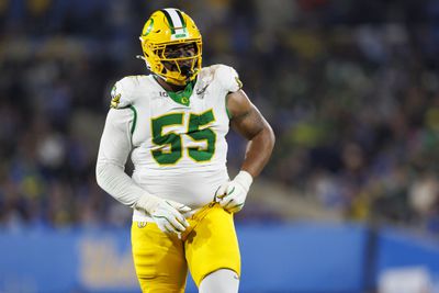 Defensive lineman Derrick Harmon #55 of the Oregon Ducks stands on the field during the second quarter of an NCAA college football game against the UCLA Bruins, at Rose Bowl on September 28, 2024 in Pasadena, California.