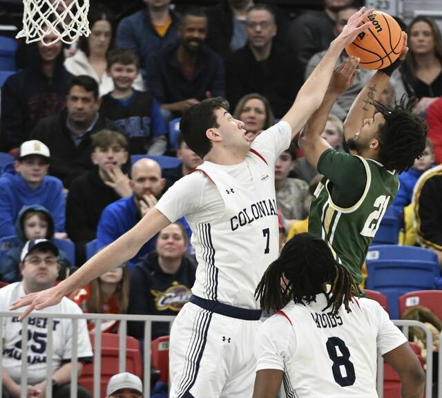 Robert Morris’ Alvaro Folgueiras blocks the shot of Wright State’s Logan Woods during Horizon League tournament action Thursday, March 6, 2025 at UPMC Events Center.