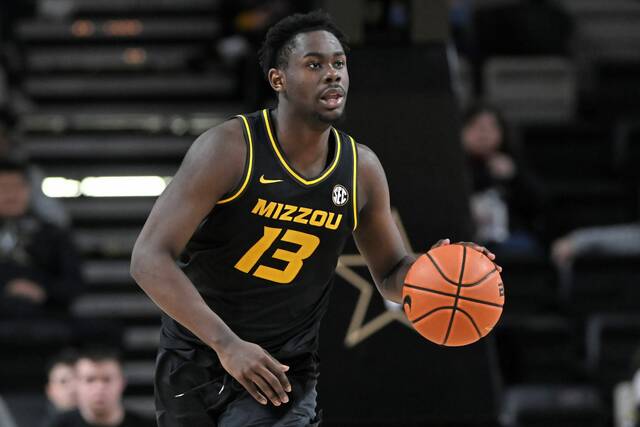 Missouri guard Kaleb Brown (13) plays against Vanderbilt during the second half of an NCAA college basketball game Tuesday, Feb. 8, 2022, in Nashville, Tenn.
