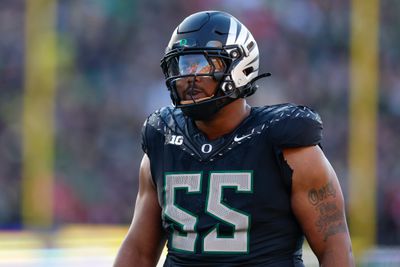 Derrick Harmon #55 of the Oregon Ducks walks between plays during the first half against the Ohio State Buckeyes at Autzen Stadium on October 12, 2024 in Eugene, Oregon.