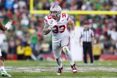 Jack Sawyer #33 of the Ohio State Buckeyes rushes the edge in the first half during the Rose Bowl against Oregon Ducks at Rose Bowl Stadium on January 1, 2025 in Pasadena, California.