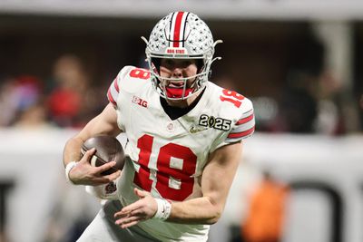 Will Howard #18 of the Ohio State Buckeyes runs with the ball during the third quarter against the Notre Dame Fighting Irish in the 2025 CFP National Championship at the Mercedes-Benz Stadium on January 20, 2025 in Atlanta, Georgia.