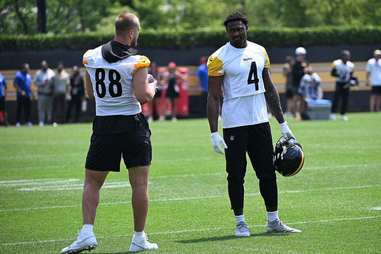 DK Metcalf #4 of the Pittsburgh Steelers talks with Pat Freiermuth #88 during Minicamp at UPMC Rooney Sports Complex on June 12, 2025 in Pittsburgh, Pennsylvania.