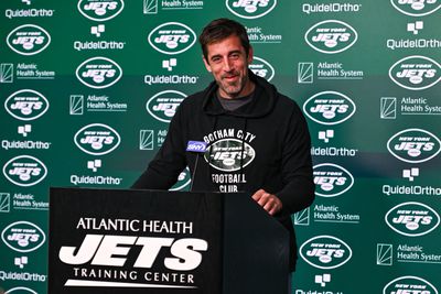 New York Jets quarterback Aaron Rodgers (8) speaks at a press conference after practice at Atlantic Health Jets Training Center.