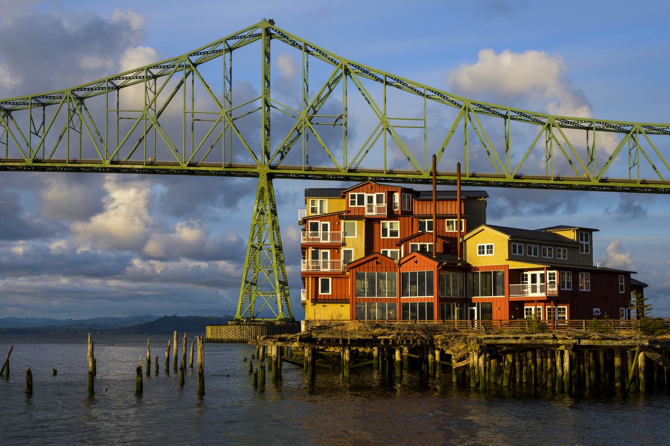 Evening Light Warms The Astoria-Megler Bridge; Astoria, Oregon, United States Of America