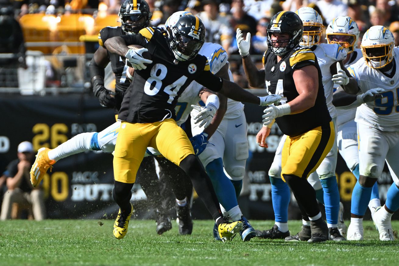 Pittsburgh Steelers running back Cordarrelle Patterson (84) gains yardage against the Los Angeles Chargers during the fourth quarter at Acrisure Stadium.