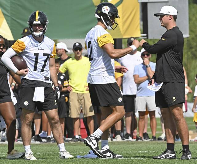 Steelers quarterbacks Mason Rudolph and Will Howard with the fist bump Monday Aug.1, 2025 Saint Vincent College.