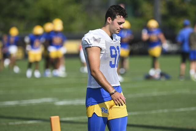 Punter Caleb Junko participates in the first day of Pitt football practice July 30 at UPMC Rooney Sports Complex on the South Side.