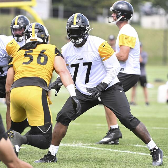 Steelers tackle Broderick Jones blocks for Aaron Rodgers last month at Saint Vincent.