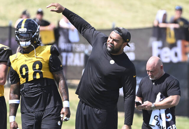 Steelers Cam Heyward stretches during practice Monday at Saint Vincent College.