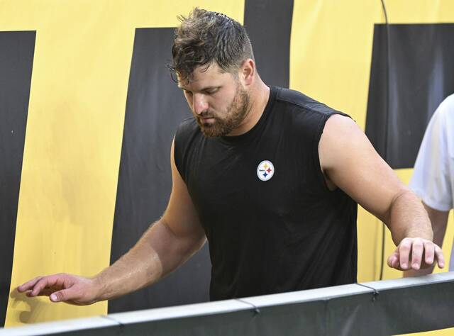 Pittsburgh Steelers long snapper Christian Kuntz goes to the locker room after suffering a chest injury during Saturday’s preseason game against the Tampa Bay Buccaneers at Acrisure Stadium.