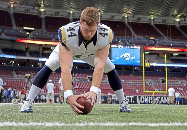 Former Rams long snapper Jake McQuaide warms up before a game Sept. 26, 2013, against the San Francisco 49ers in St. Louis.