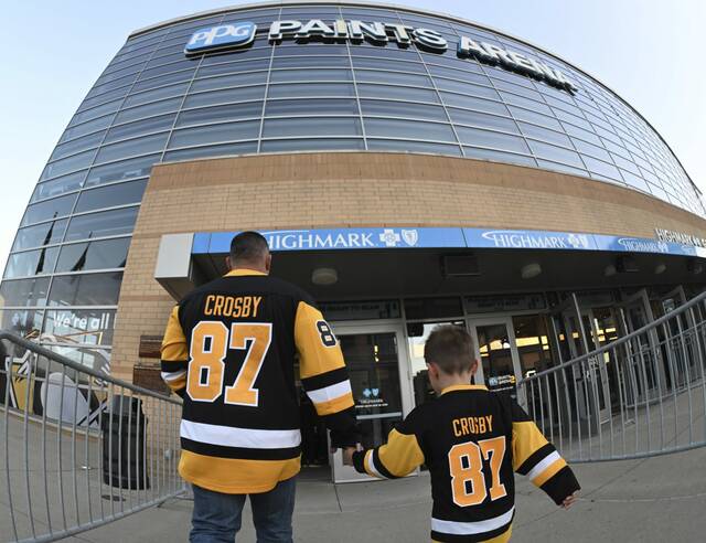 Penguins fans enter for the home opener against the Rangers on Oct. 9, 2024 at PPG Paints Arena.