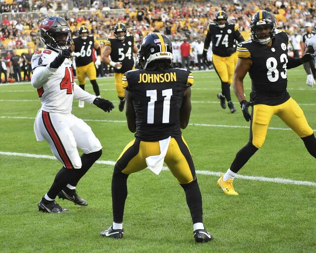 Pittsburgh Steelers receiver Brandon Johnson beats Tampa Bay Bucs defensive back Deion Jones for a touchdown during the first quarter of this past Saturday’s preseason game at Acrisure Stadium.