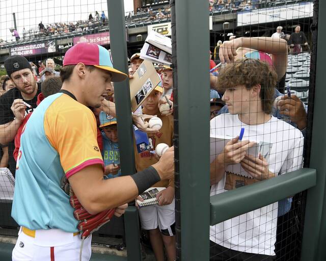 The Curve’s Konnor Griffin signs autographs for fans before making his Class AA debut on Tuesday, Aug. 19, 2025, at PNG Field in Altoona.