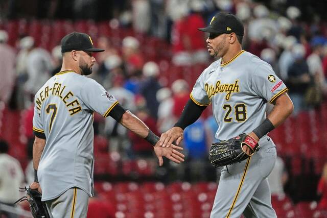 Pirates outfielder Tommy Pham (28) and Isiah Kiner-Falefa celebrate a victory over the St. Louis Cardinals on Wednesday.